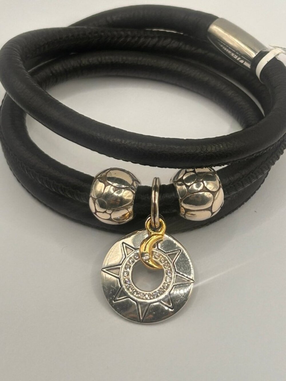 Brighton triple black leather woodstock bracelet w/2 pebble beads and 1 sun  23"